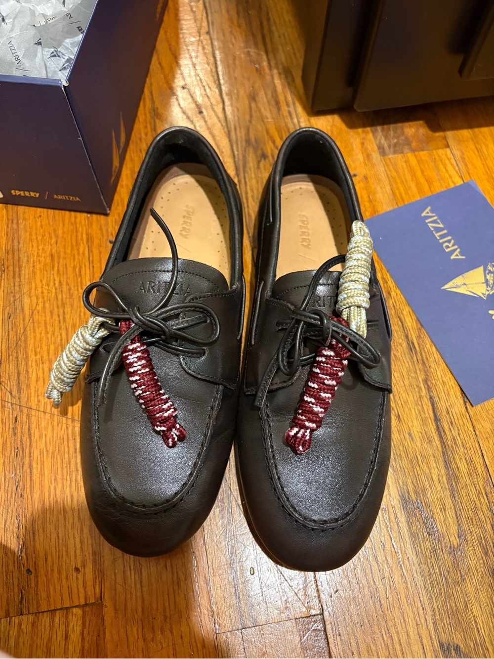 Aritzia Black Leather Boat Shoes with Burgundy Cord Accents